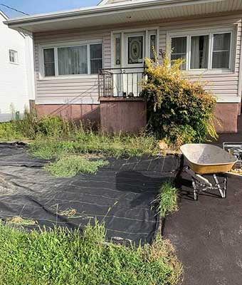 front yard of property being cleared prior to grading