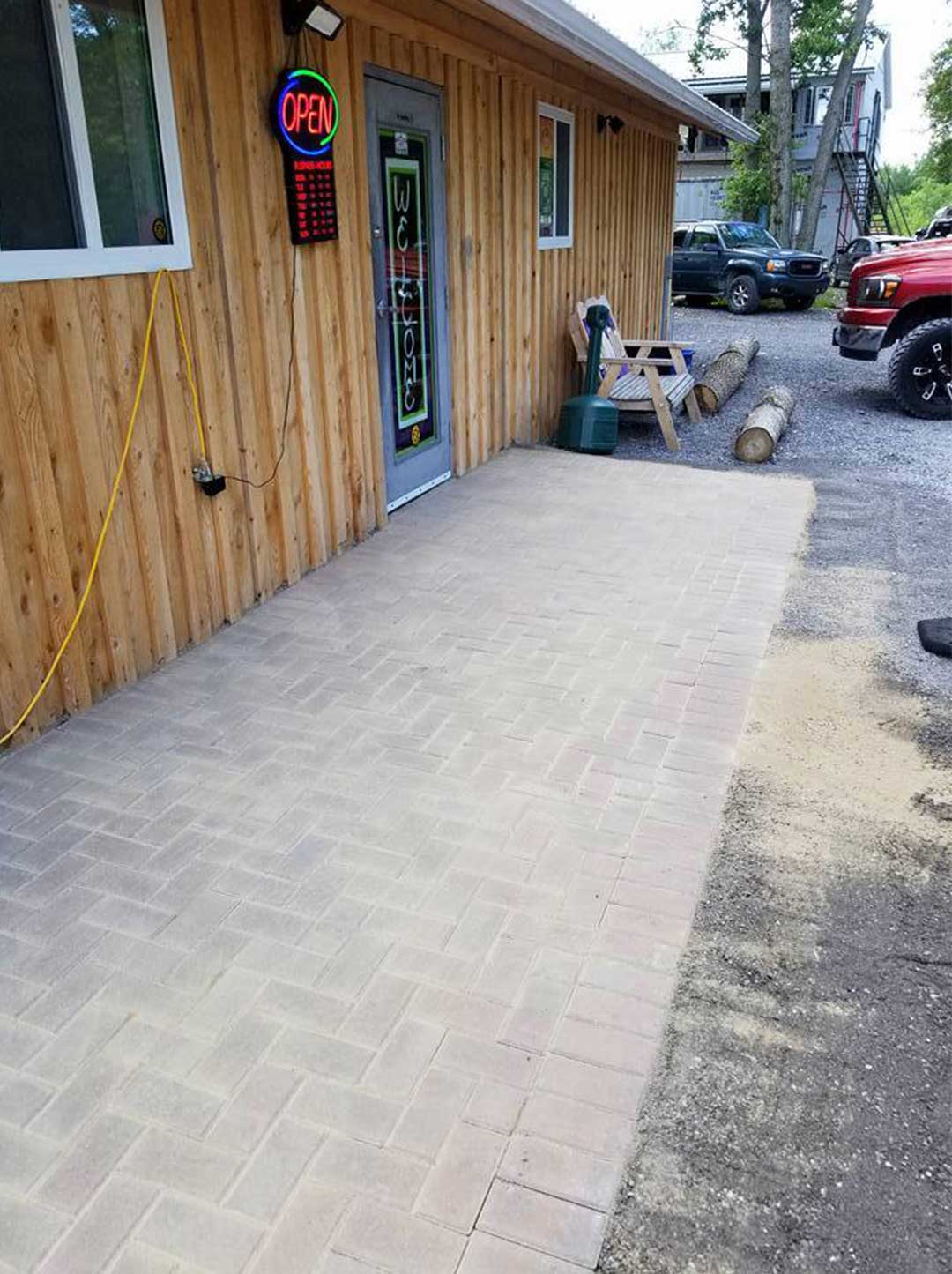 interlocking stone path leading to front door of business